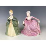 A Coalport figurine entitled Polly together with one other entitled Marjorie