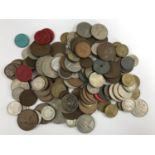 Sundry coins and Belfast City Tramways plastic tokens