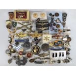 A large quantity of military badges and insignia