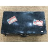A vintage fibre cabin trunk or suitcase bearing Cunard Line shipping labels