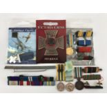 A quantity of medal miniatures, and ribbons etc