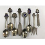 A number of Royal Navy and similar commemorative spoons and a book mark
