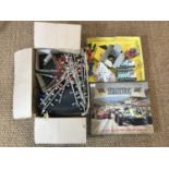 Vintage Scalextric model racing cars and a quantity of track