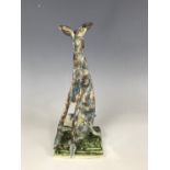 A contemporary craft / studio pottery figure of a greyhound by the Peak District ceramicist Rosalind