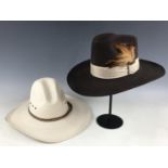 A Sahuayo Summit "Cowboy" hat, size 7 3/8, together with a Bee Deluxe Westerner hat, both in