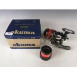 An Okuma distance Surf 80 fishing reel