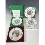 Four boxed Royal Doulton Christmas plates, two from the year 1977, the others from 1978 and 1985