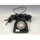 A mid 20th century Bakelite telephone