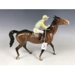 A Beswick race horse and jockey, model number 1037, 21 cm