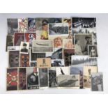A quantity of largely period German Third Reich photographs and postcards etc