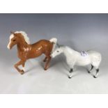 A Beswick Palomino horse, together with one other Beswick horse