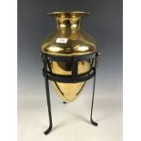 A large floor standing brass urn with stand, 52 cm