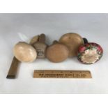 A collection of treen darning mushrooms, including a Tartanware example in the 'Stuart' plaid (a/f),