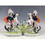 A pair of Staffordshire mounted figures