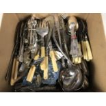 An extensive suite of electroplate cutlery including part sets and serving flatware etc