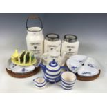 A Ringtons milk churn, storage jars and a tea for one group etc