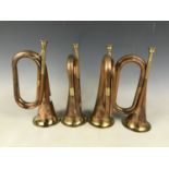 Four Boosey copper Class A bugles