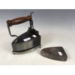 A Victorian box iron together with a trivet and second slug