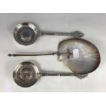 A pair of late 19th century Egyptianate electroplate servers, and an electroplate-handled shell