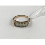 A 9ct gold and opal dress ring, 2.7g (a/f)