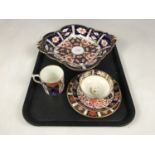 A Royal Crown Derby bowl together with two cups, a saucer and a plate (all a/f)