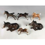 Five Beswick foals together with one other figurine