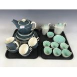 Two Poole Pottery tea services (teapot and water pot a/f)