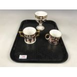 A Royal Crown Derby goblet, loving cup and coffee can