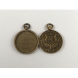 Two 1920s Newcastle and District Motor Club car prize fob medallions