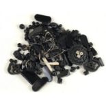 A quantity of unstrung Victorian jet jewellery beads, including carved spacers decorated with