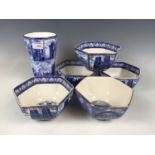 A Ringtons Land Marks blue and white vase together with four Ringtons cathedral bowls and a bridge