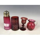 Four items of Victorian ruby flashed / cranberry glass including a sugar castor etc
