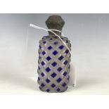 A Victorian white-metal mounted and blue-flashed cut glass scent bottle, 10 cm