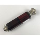 A Victorian white-metal mounted double-ended cranberry glass scent bottle (a/f)