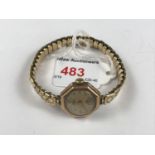 A lady's 9ct gold cased Elco wristwatch, having a circular silvered face, Arabic numerals and a