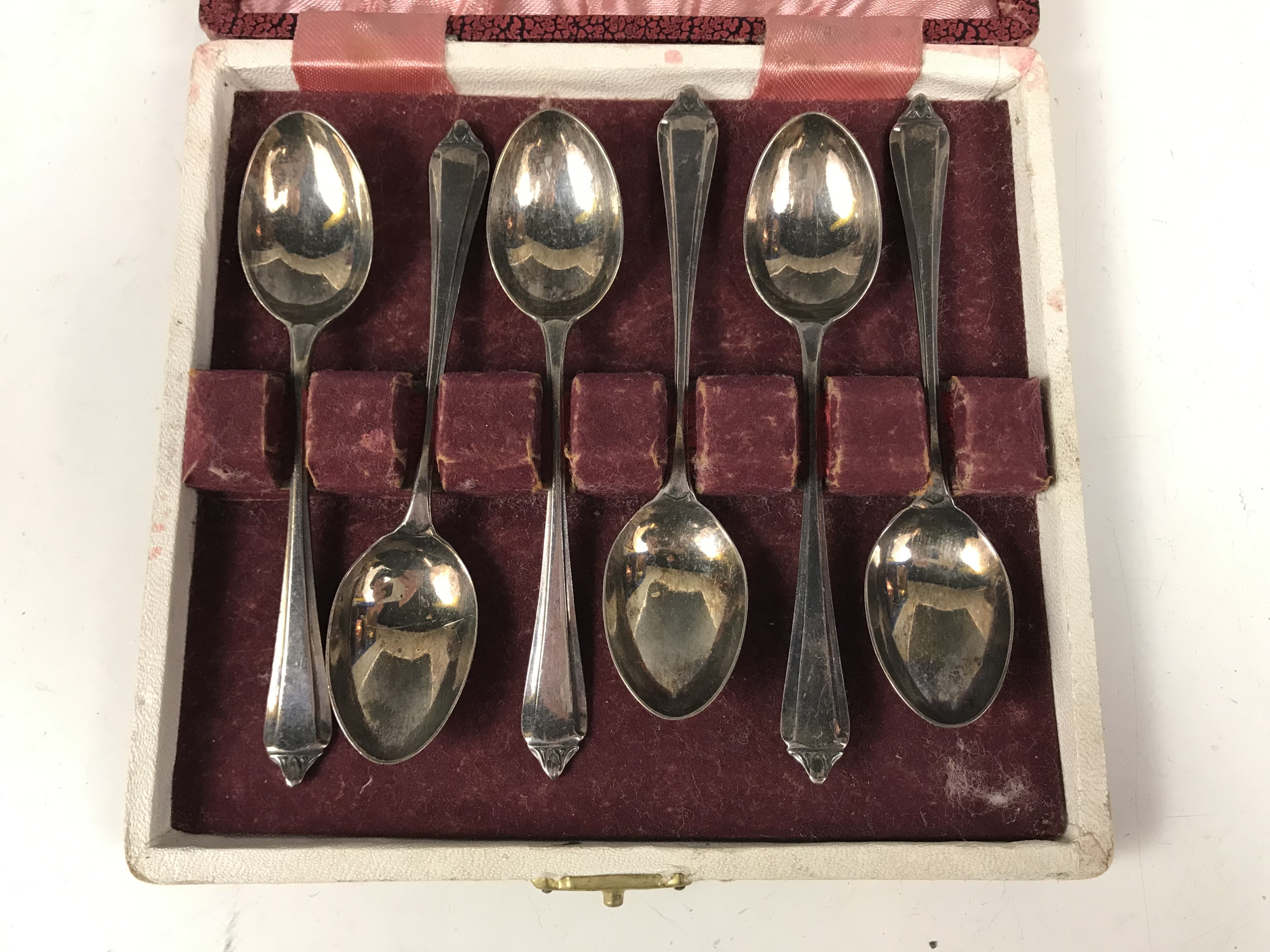 A cased set of six silver coffee spoons