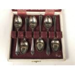 A cased set of six silver coffee spoons