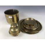 An Indian engraved brass cachepot together with a tray and table bell etc