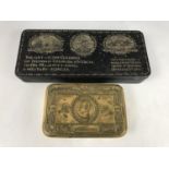 A 1914 Princess Mary gift tin together with one other Gift to the Troops