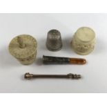 Antique collectors' items, including a silver-mounted cheroot holder with amber mouthpiece, a silver