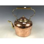 A large copper and brass kettle, 42 cm
