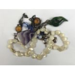 Vintage hardstone jewellery, to include a Blue John cabochon pendant on white-metal chain, a jade