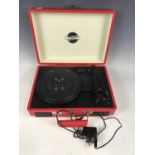 A retro Zennox CWB portable record player