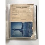 A ring binder containing a large quantity of assorted German Third Reich documents and ephemera