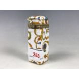 A floral ceramic travel scent bottle holder