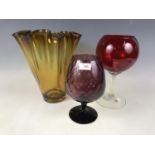 A large contemporary amber glass vase, 32 cm, together with a red goblet, 32 cm and one other