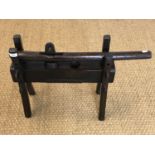 An antique rustic Chinese wooden noodle press