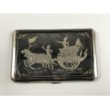 A Siamese white-metal cigarette case, having niello decoration to the cover, marked 'sterling',