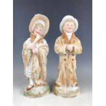 A pair of late 19th century bisque figurines (one a/f)