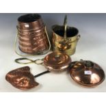 Two antique copper warmers together with a skimmer, an ember box a small coal helmet